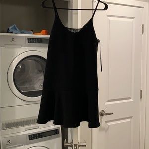 Black peplum dress with lace detail